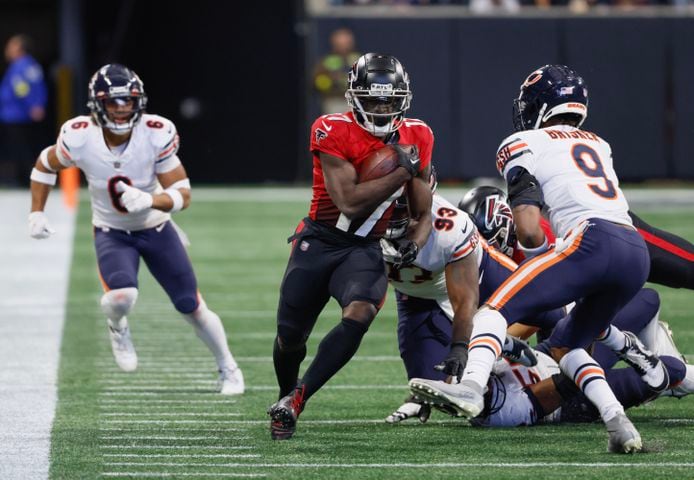 Falcons wide receiver Olamide Zaccheaus runs for a first down during the third quarter against the Bears on Sunday.  The Falcons won 27-24. (Bob Andres / for The Atlanta Journal-Constitution)