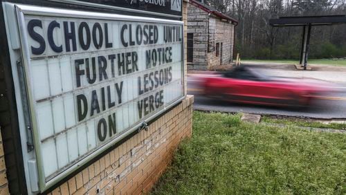 March 18, 2020 Atlanta: A sign says it all to passing motorists at Murphey Candler Elementary School at 6775 S Goddard Road in Lithonia, DeKalb County on Wednesday, March 18, 2020. Gov. Brian Kemp ordered the closure of all public elementary, secondary and post-secondary schools in Georgia that began Wednesday and will continue through the end of the month as the state scrambles to contain the coronavirus pandemic. School districts accounting for more than 1.7 million of Georgiaâs 1.8 million students had already suspended classes, though some rural schools have remained open. And most Georgia colleges shifted to online coursework last week. Just over two weeks after the first confirmed coronavirus case in Georgia, much of the state is practicing social distancing, with restaurants, theaters and other social gathering places closing down or reducing hours in an attempt to slow the spread of COVID-19, the disease caused by the new coronavirus. JOHN SPINK/JSPINK@AJC.COM