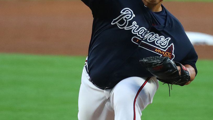 Braves pitcher Bartolo Colon threw a called strike in the first pitch of the first game at SunTrust Park, an 8-5 exhibition win Friday against the Yankees. (Curtis Compton/ccompton@ajc.com)