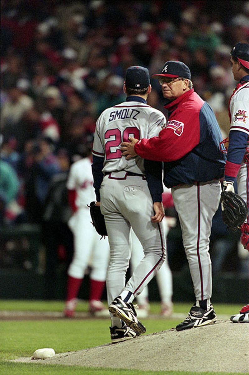 Braves manager Bobby Cox (right) pulls starting pitcher John Smoltz after a disastrous start in Game 3 of the World Series Oct. 24, 1995, in Cleveland.  (Jonathan Newton/AJC)