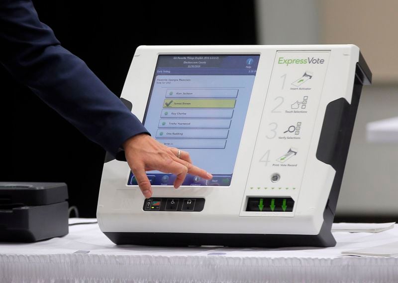 Voters tap a touchscreen to make their selections, similar to the state’s current voting machines.