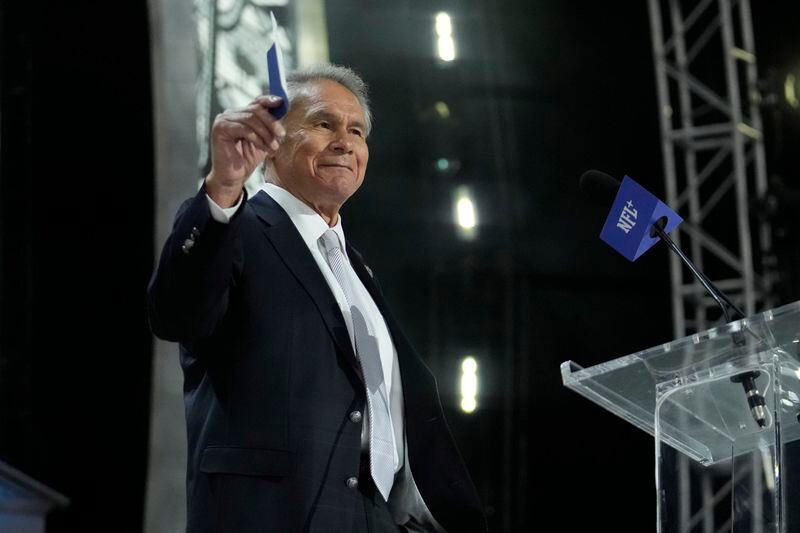 Former player Jim Plunkett announces a pick for the Las Vegas Raiders during the second round of the NFL football draft, Friday, April 26, 2024, in Detroit. (AP Photo/Jeff Roberson)