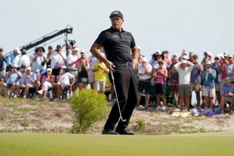 Phil Mickelson reacts on the sixth green during the third round at the PGA Championship golf tournament on the Ocean Course, Saturday, May 22, 2021, in Kiawah Island, S.C. (AP Photo/Chris Carlson)