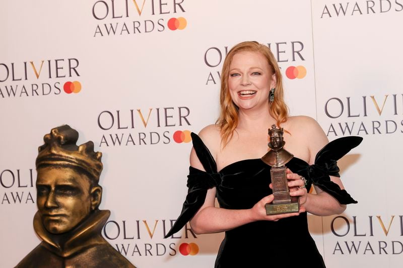 Sarah Snook, winner of the best actress award for "The Picture Of Dorian Gray", poses for photographers in the winner's room during the Olivier Awards on Sunday, April 14, 2024, in London. (Photo by Vianney Le Caer/Invision/AP)