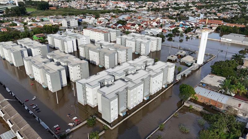 Residential buildings stand in flood water after heavy rain in Canoas, Rio Grande do Sul state, Brazil, Wednesday, May 8, 2024. (AP Photo/Carlos Macedo)