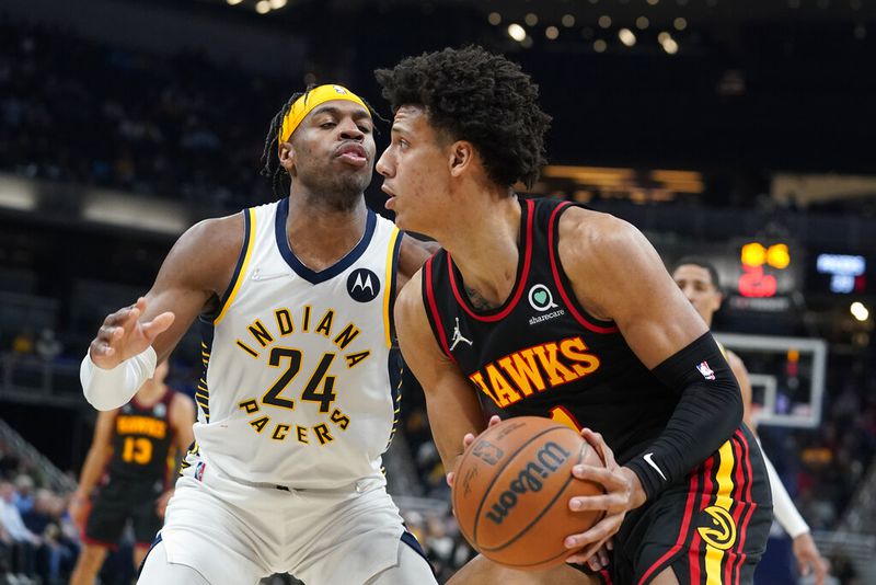 The Hawks picked Jalen Johnson (right) in the first round in the 2021 NBA draft. He was the 20th overall selection. (AP file photo)