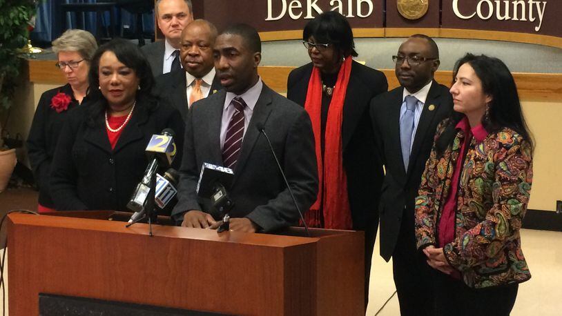 DeKalb County’s CEO and Board of Commissioners would be restructured on legislation introduced in the Georgia General Assembly on Monday. Pictured are Interim DeKalb CEO Lee May surrounded by commissioners.