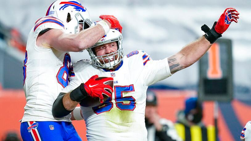 Buffalo Bills tight end Lee Smith (85) celebrates a touchdown against the Denver Broncos during an NFL football game, Saturday, Dec. 19, 2020, in Denver. (AP Photo/Jack Dempsey)