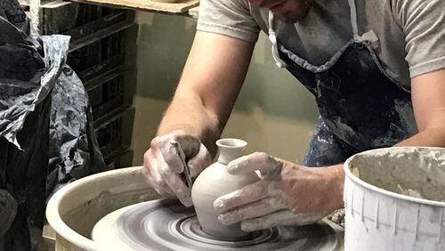 Pigeon River Pottery at the Old Mill in Pigeon Forge features artisans hard at work at their craft. Mary Ann Anderson/TNS