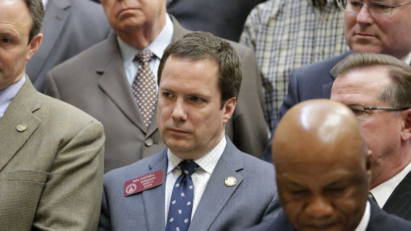 Rep. Wes Cantrell, center in this picture from March 2016, said victims of sexual abuse “go through years enduring something they should not have to endure.” Thirty-one states states already require the type of education for students that his bill seeks. BOB ANDRES / BANDRES@AJC.COM