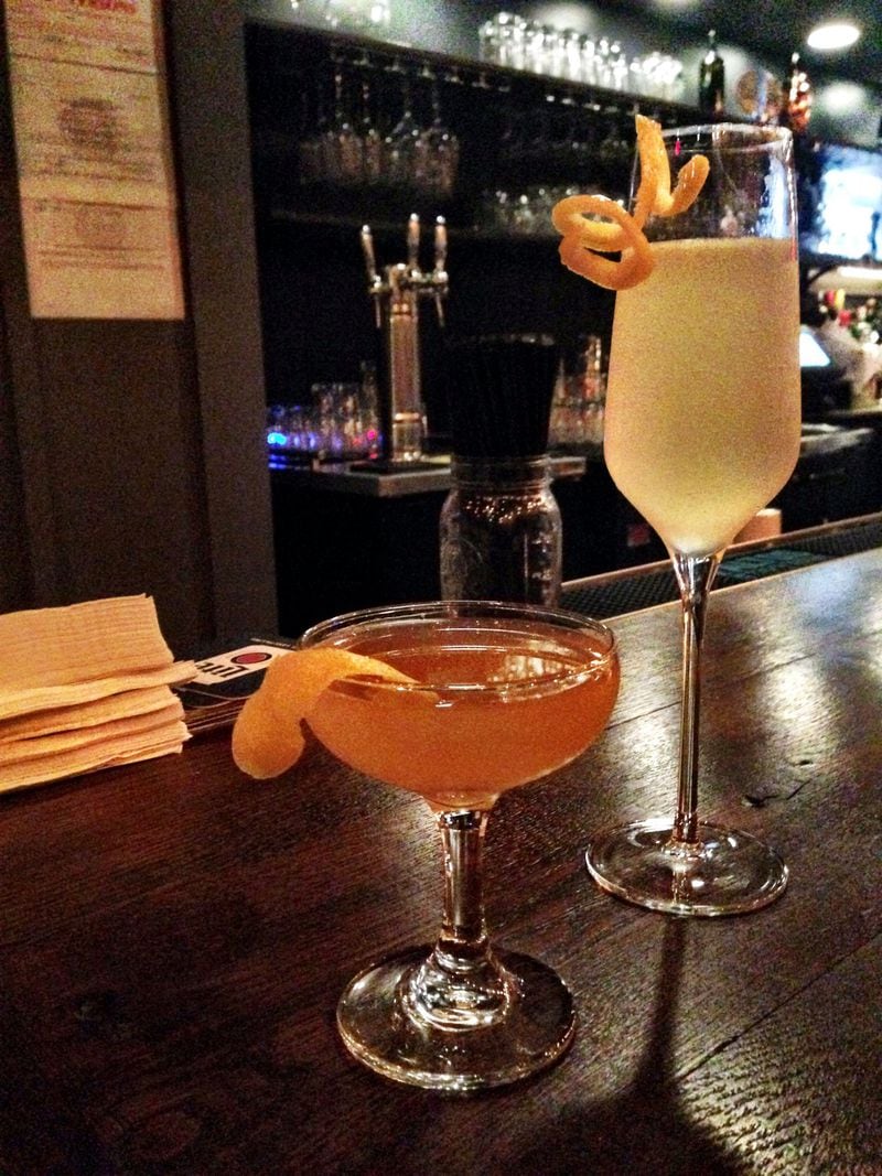 The bar at Poor Hendrix focuses on classic cocktails, like the French 75 (which is in the tall glass), and local beers. CONTRIBUTED BY WYATT WILLIAMS