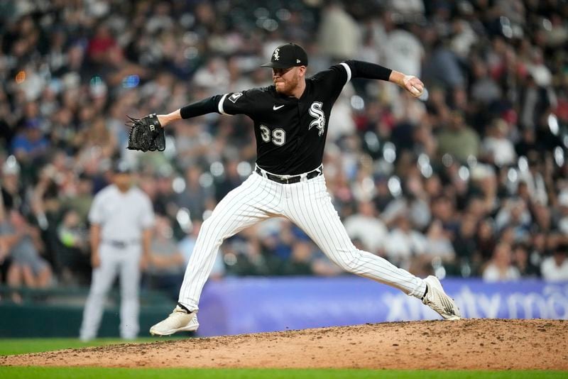 Chicago White Sox relief pitcher Aaron Bummer delivers during a baseball game against the New York Yankees Wednesday, Aug. 9, 2023, in Chicago. (AP Photo/Charles Rex Arbogast)