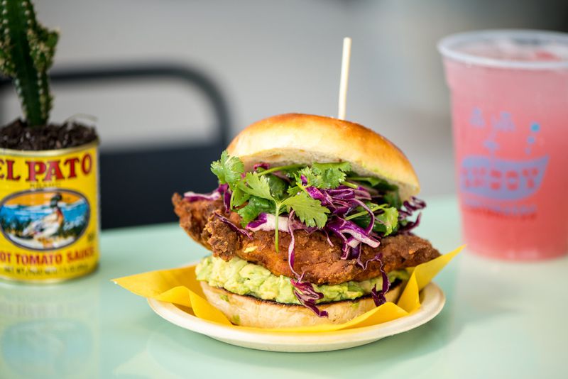 Little Rey La Torta, crispy chicken breast, smashed avocado, spicy slaw, and pickled jalapeno. Photo credit- Mia Yakel.