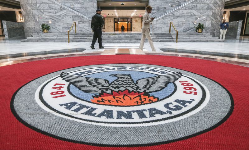 Employees at Atlanta City Hall were handed instructions as they come through the front doors to not turn on computers or log on to their workstations on Friday March 23, 2018. Friday’s action comes as city officials are struggling to determine how much sensitive information may have been compromised in a Thursday cyberattack.  JOHN SPINK/JSPINK@AJC.COM