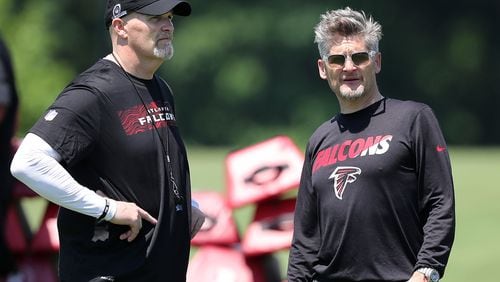 Falcons head coach Dan Quinn and general manager Thomas Dimitroff take in the first day of rookie-mini-camp on Friday, May 11, 2018, in Flowery Branch.  Curtis Compton/ccompton@ajc.com
