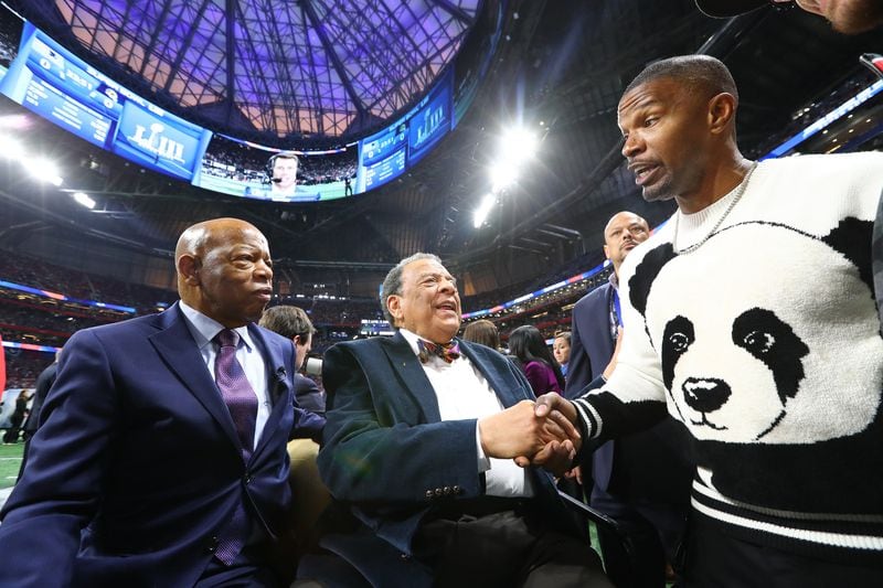 2/3/19 - Atlanta - John Lewis and Andrew Young on the field with Jamie Foxx before the New England Patriots play the Los Angeles Rams in Super Bowl LIII on Sunday, Feb. 3, 2019 at Mercedes-Benz Stadium in Atlanta, Ga.   &#xD;CURTIS COMPTON / CCOMPTON@AJC.COM