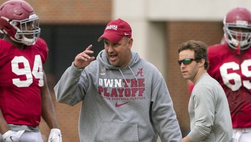 Alabama defensive coordinator Jeremy Pruitt works with his players during football practice at the Thomas-Drew Practice Fields in Tuscaloosa, Ala. (Vasha Hunt/AL.com via AP)