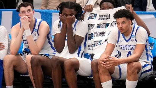 Players on the Kentucky bench watch late in the second half of the team's college basketball game against Oakland in the first round of the men's NCAA Tournament in Pittsburgh, Thursday, March 21, 2024. Oakland won 80-76. (AP Photo/Gene J. Puskar)