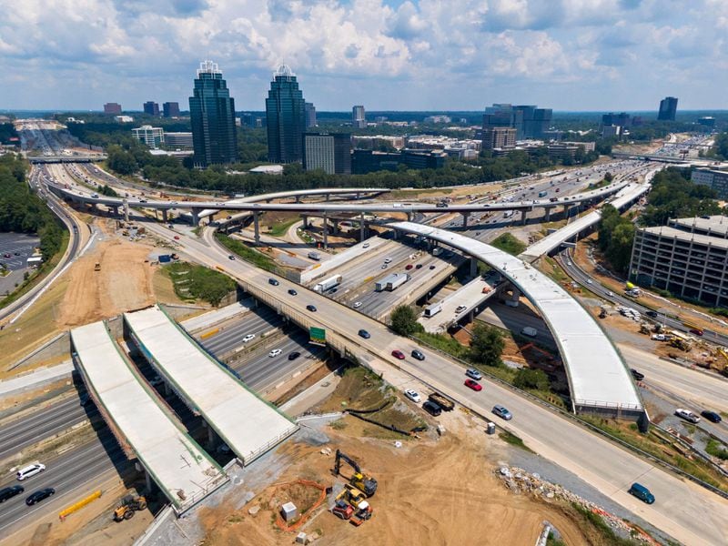 Aerial photo shows construction site of I-285 interchange at Ga. 400 in Sandy Springs on Friday, August 13, 2021. Georgia Department of Transportation gave The Atlanta Journal-Constitution a tour to show project progress, as well as provide early notification of upcoming impacts, openings, and future activities related to the I-285 lane reductions. (Hyosub Shin / Hyosub.Shin@ajc.com)