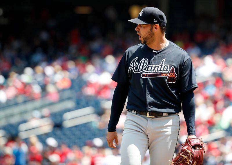 Braves starting pitcher Anibal Sanchez reacts as he walks off the field after being hit by a ball off the bat of Washington Nationals' Michael Taylor during the second inning. (AP Photo/Alex Brandon)