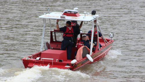 A Cherokee County Fire Rescue boat searches Lake Allatoona for a boater who went missing after a crash Thursday. (Credit: Cherokee County Fire Rescue)