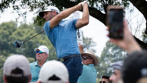 Dustin Johnson tees off on the 4th hole during the final round of the PGA Tour Championship on Sunday, Sept. 5, 2021, at East Lake Golf Club in Atlanta. (Ben Gray/For the AJC)