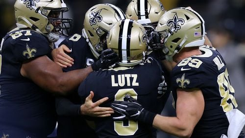 Good times in New Orleans: Saints kicker Wil Lutz celebrates with his crew after kicking a game-winning 58-yard field goal against Houston on Sept. 9. (Photo by Jonathan Bachman/Getty Images)