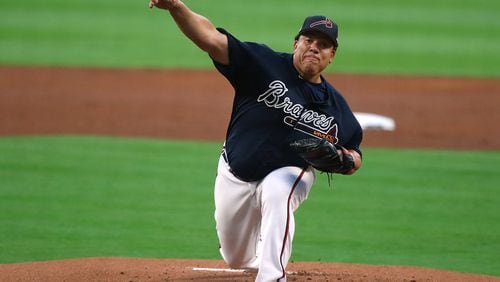 Bartolo Colon delivers a pitch in Friday’s exhibition against the Yankees in Atlanta. On Wednesday, he makes his Braves regular-season debut in New York when he faces the team for whom he played the past three seasons, the Mets. (Curtis Compton/AJC file photo)