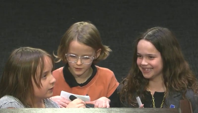 The Recess Rangers — (from left) June Simmons, Daphne Murray and Berkley Carter — speak at the February Cobb school board meeting in favor of longer recess times. (Courtesy of Cobb County School District)