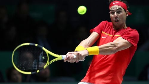 Rafael Nadal of Spain plays a backhand against Karen Khachanov of Russia during Day 2 of the 2019 Davis Cup at La Caja Magica on November 19, 2019 in Madrid, Spain. (Photo by Clive Brunskill/Getty Images)