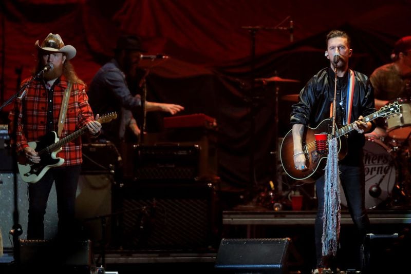John Osborne and T.J. Osborne of The Brothers Osborne perform onstage during the ATLIVE Concert 2019 at Mercedes-Benz Stadium on November 17, 2019 in Atlanta, Georgia. (Photo by Carmen Mandato/Getty Images)