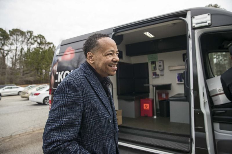 Bible Way Ministries Pastor Monte Norwood prepares to get an HIV/AIDS test administered inside an Aids Healthcare Foundation mobile testing bus at Bible Gateway Ministries in Atlanta’s Norwood Manor neighborhood, Wednesday, December 11, 2019. Pastor Norwood has been tested in front of his congregation to show the importance of knowing your status. 