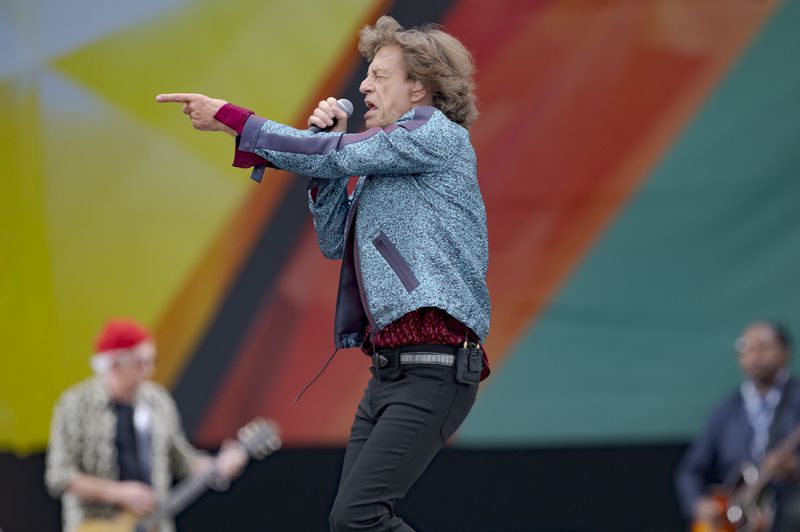 Mick Jagger, right, and Keith Richards, of the Rolling Stones, perform during the New Orleans Jazz and Heritage Festival in New Orleans, Thursday, May 2, 2024. (AP Photo/Matthew Hinton)