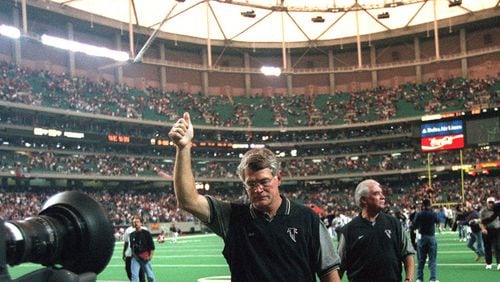 Dan Reeves gives fans the thumbs up as he exits the Georgia Dome field Sunday, Nov. 17,1998, after the Atlanta Falcons defeated the San Francisco 49ers.