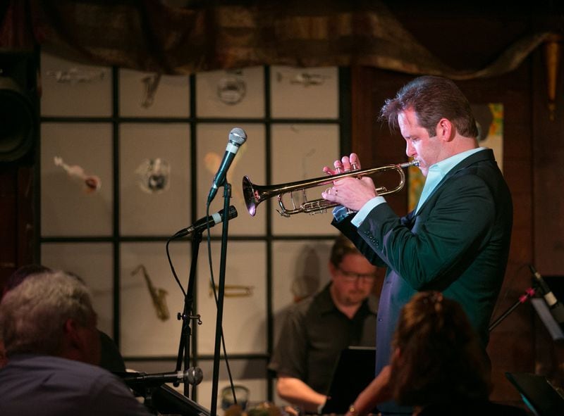 Trumpeter Joe Gransden performs with vocalist Robin Latimore at The Select on New Year's Eve. PHOTO / JASON GETZ