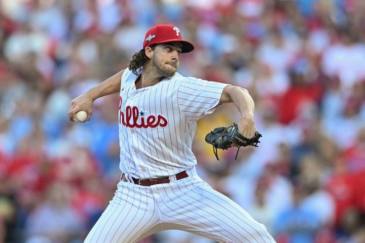 Philadelphia Phillies starting pitcher Aaron Nola (27) delivers to the Atlanta Braves during the first inning of NLDS Game 3 in Philadelphia on Wednesday, Oct. 11, 2023.   (Hyosub Shin / Hyosub.Shin@ajc.com)
