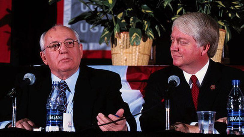 Former Soviet President Mikhail Gorbachev, left, and University of Georgia President Michael F. Adams hold a press conference at Stegeman Coliseum Friday, Dec. 3, 1999 on the University of Georgia campus in Athens.