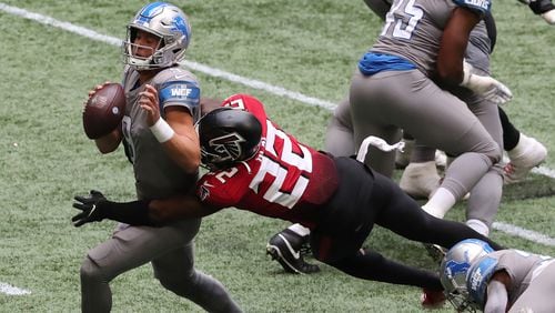 Falcons safety Keanu Neal sacks Detroit Lions quarterback Matthew Stafford during the third quarter Sunday, Oct. 25, 2020, at Mercedes-Benz Stadium in Atlanta. (Curtis Compton / Curtis.Compton@ajc.com)