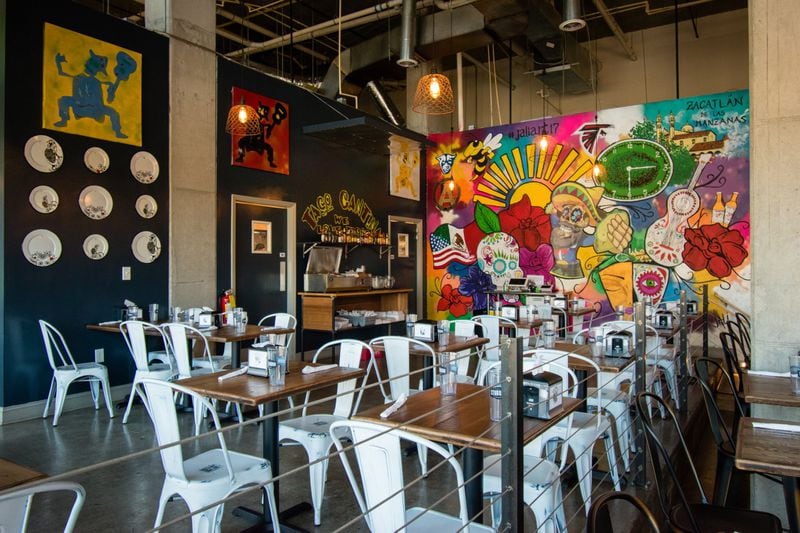 Taco Cantina’s colorful wall mural is the decorative centerpiece of the dining room. CONTRIBUTED BY HENRI HOLLIS
