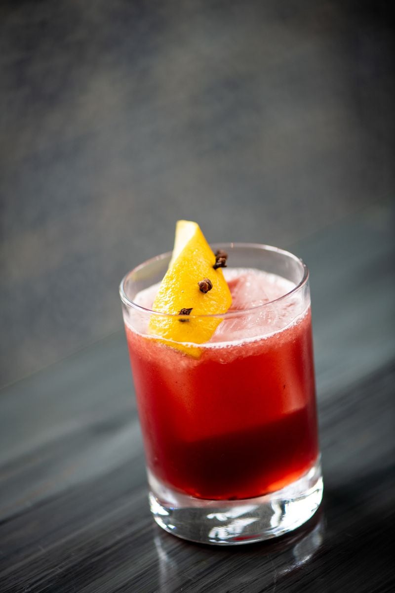 Monkey 68's Charming Snake cocktail is sweet and smoky, with a kick from a house-made blackberry-peppercorn shrub. Courtesy of Monkey 68