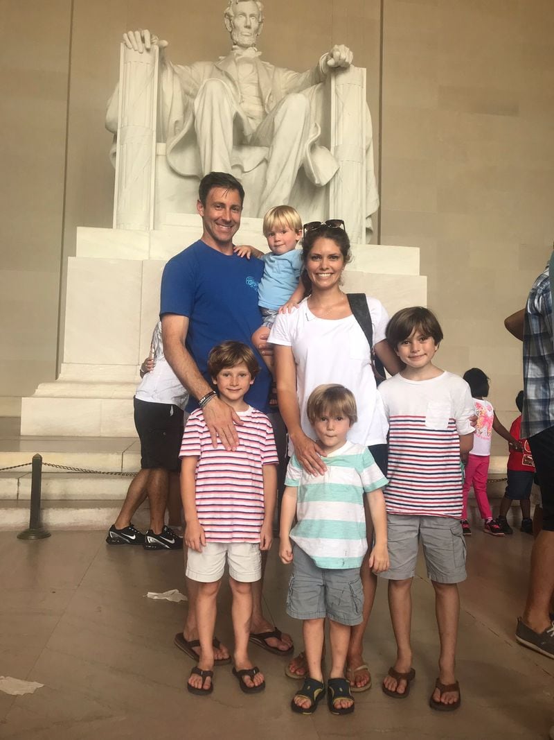New Georgia Tech co-defensive coordinator and safeties coach Nathan Burton with wife Britney and their four sons (left to right: Grady, William, Isaac and Charlie) at the Lincoln Memorial this past summer. (Courtesy Britney Burton)