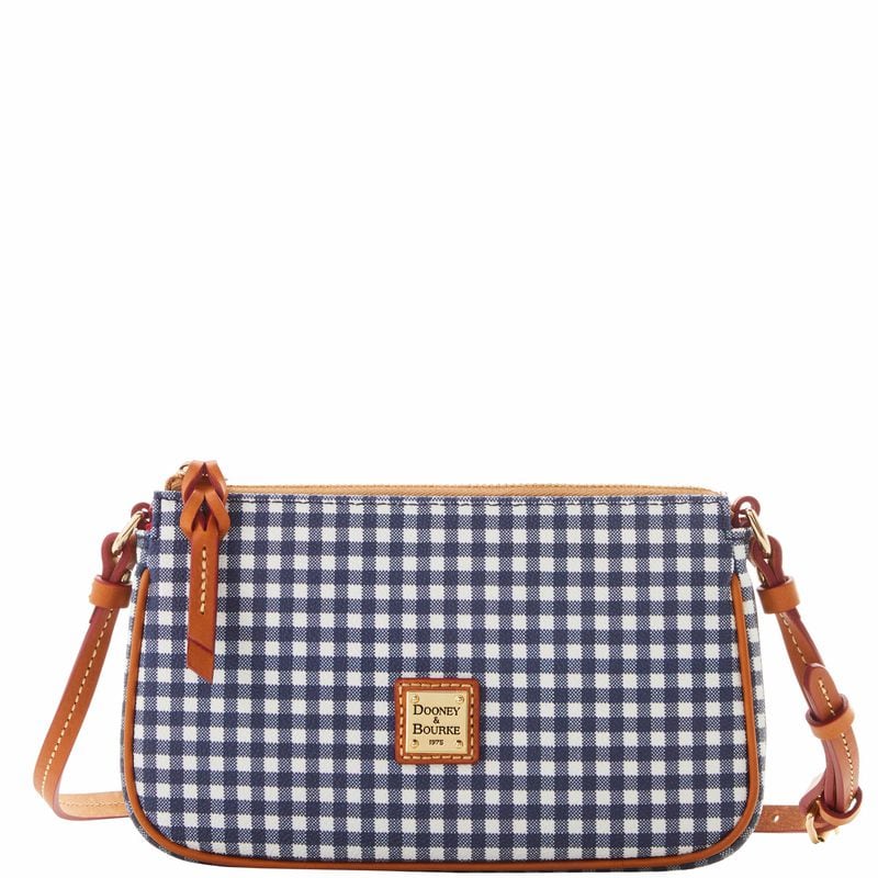 A handbag ensures she has everything she needs when she's on the go.
Courtesy of Dooney & Bourke