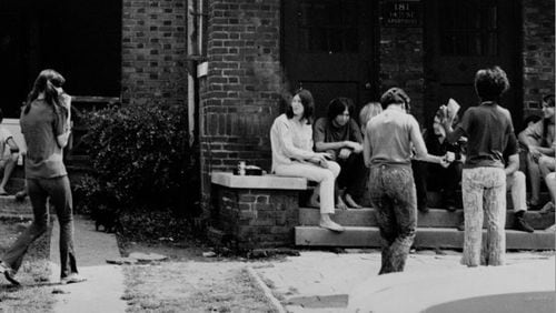 September 1968 -- Young people gather outside of a Midtown apartment complex on 14th Street.