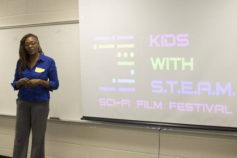Amanda Ray, founder and CEO of the Multicultural Sc-fi Organization, speaks with fifth-graders during the first Kids with STEAM Film Festival at Mason Elementary in Duluth, Thursday, May 4, 2018. ALYSSA POINTER/ALYSSA.POINTER@AJC.COM