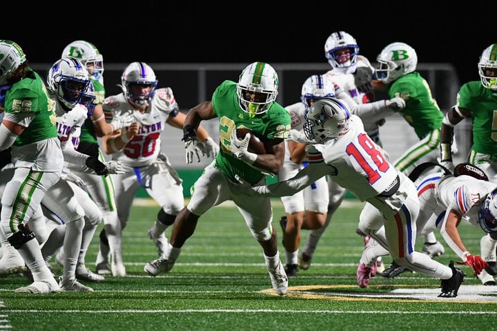 Justice Haynes, running back for Buford, runs for a touchdown during the Walton vs. Buford game on Friday, Nov. 18, 2022, at Buford High School. (Jamie Spaar for the Atlanta Journal Constitution)