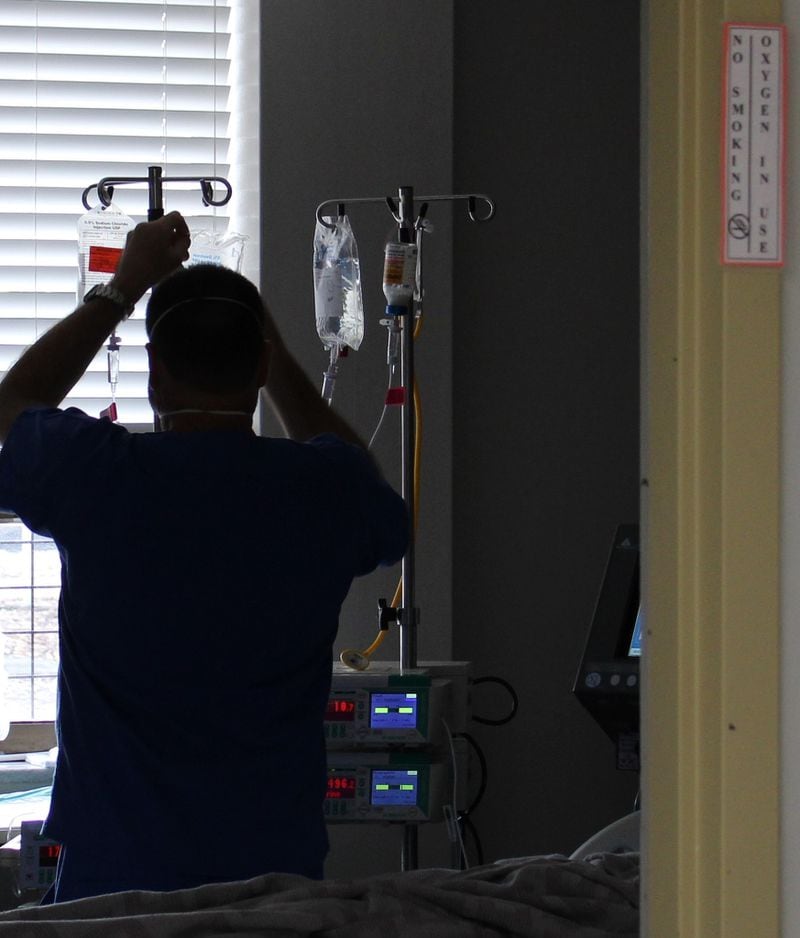 Medical staff in the ICU at Dorminy Medical Center in Fitzgerlad prepare IV fluids for patients. With an average daily census of 11 patients, the hospital is operating at 23 percent capacity. (Dorminy Medical Center)