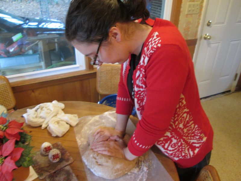 Olivia King of Decatur kneads bread dough made with her grandmother’s recipe. CONTRIBUTED BY BILL KING