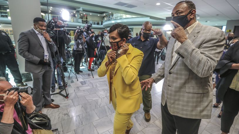 Atlanta Mayor Keisha Lance-Bottoms adjusts her mask following a press conference in May. (John Spink / John.Spink@ajc.com)