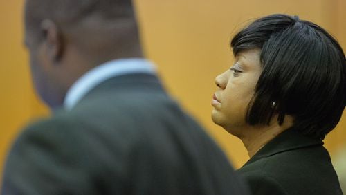 APRIL 30, 2015 ATLANTA Former APS SRT Director Tamara Cotman listens as she is resentenced. Fulton County Superior Court Judge Jerry Baxter holds a re-sentencing hearing in Fulton County Superior Court, Thursday, April 30, 2015. Former regional directors Tamara Cotman, Sharon Davis-Williams and Michael Pitts were given the heftiest punishment — 20 years, seven years to be served in prison and 13 years on probation following their convictions racketeering and other charges in the Atlanta Public Schools test-cheating trial. Fulton County Superior Court Judge Jerry Baxter resentenced the trio to 3 years in prison, 7 years probation, $10,000 fine and 2000 hours of community service. (Atlanta Journal-Constitution, Kent D. Johnson, Pool)