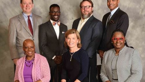 Members of the DeKalb County Board of Education (standing from left) include Chairman Marshall Orson, Diijon DaCosta, Stan Jester, Michael Erwin (seated from left) Joyce Morley, Allyson Gevertz and Vice-Chairwoman Vickie B. Turner. (Photo Courtesy DeKalb County School District)